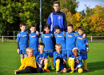 Bild das ein Kinderfußballteam abbildet